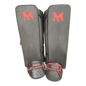 Monarch pads and kickers Large field hockey goalkeeper set in black with red straps