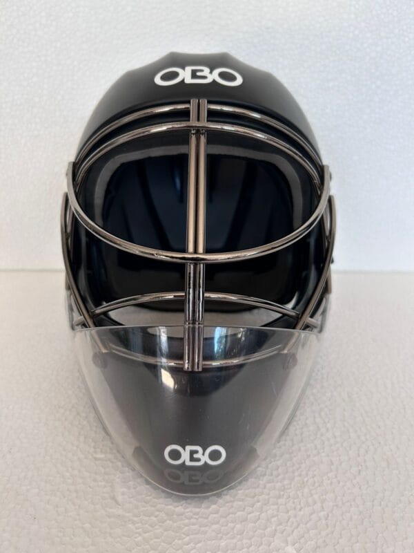 OBO ABS Large black field hockey goalkeeper helmet with silver face cage and clear throat protector