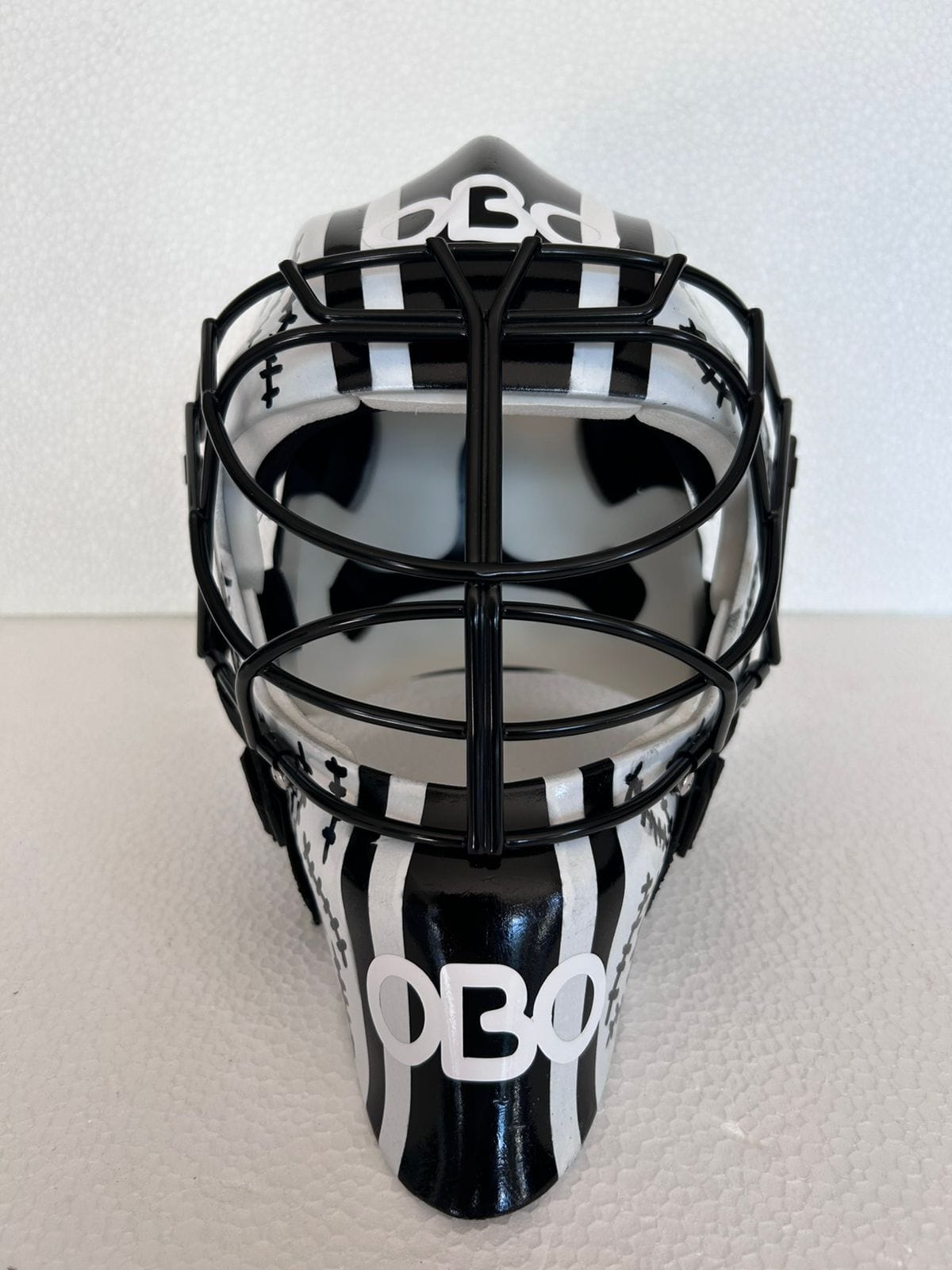 OBO PE Custom Large black and white field hockey goalkeeper helmet with black full-face cage
